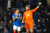 Rangers' James Tavernier and goalkeeper Jack Butland applaud the fans at Ibrox. (Photo by Andrew Milligan/PA Wire)
