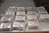 Officers discovered more than £170,000 in cash hidden inside a vehicle in Belfast.