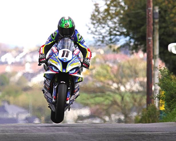Dominic Herbertson dominated the Open Superbike race at the Cemcor Cookstown 100 on the Burrows Engineering/RK Racing BMW