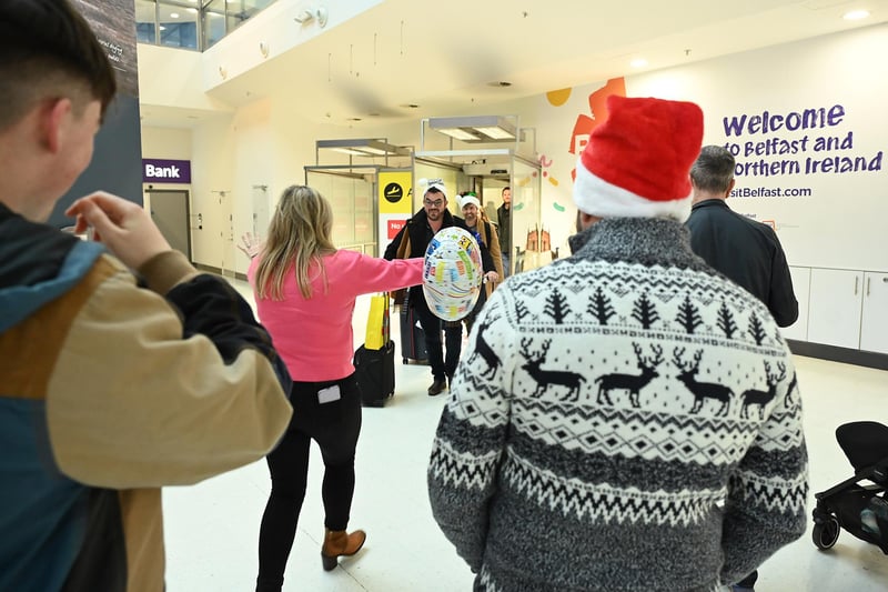 As Santa's arrival draws ever closer, friends and families were reunited at arrivals back home in Northern Ireland.  Families reunited for Christmas at George Best Belfast City Airport today
Picture By: Arthur Allison: PacemakerPress.