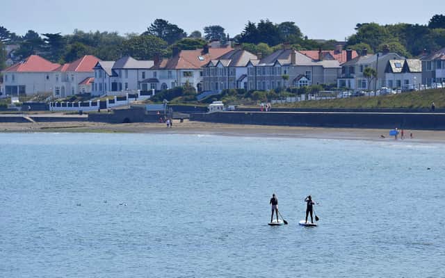 Paddle Boarding on Ballyholme Beach. Picture By:  Pacemaker.
