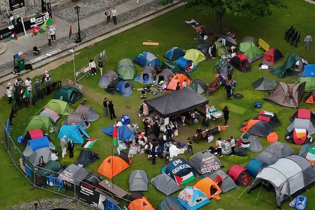 Students taking part in an encampment protest over the Gaza conflict on the grounds of Trinity College in Dublin on 8 May. Photo: Niall Carson/PA Wire