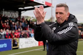 ​Stephen Baxter salutes the supporters at Seaview after a 3-2 win over Coleraine which secured the club European football in his final Irish League game as manager of Crusaders. (Photo by David Maginnis/Pacemaker Press)