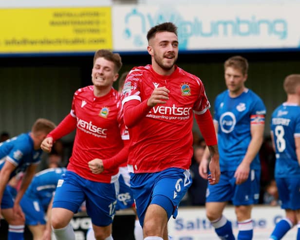 Linfield's Jack Scott after scoring for the club against Loughgall earlier in the season. (Photo by David Maginnis/Pacemaker Press)