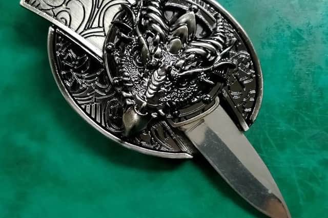 PSNI image of knife in belt buckle - PSNI Armagh Banbridge Craigavon Facebook