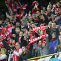 Larne fans were jubilant after effectively sealing a second successive Gibson Cup triumph on Monday night