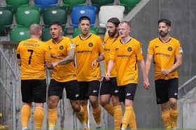 Carrick Rangers will aim to continue their pursuit of a top-six finish as they host Newry City this afternoon