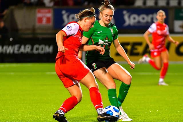 Cliftonville's Abbie Magee holds off a challenge from Glentoran's Kerry Beattie at Solitude on Wednesday.