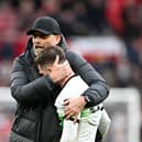 Liverpool manager Jurgen Klopp embraces Alexis Mac Allister after the Premier League draw with Manchester United. (Photo by Michael Regan/Getty Images)