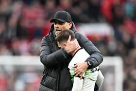 Liverpool manager Jurgen Klopp embraces Alexis Mac Allister after the Premier League draw with Manchester United. (Photo by Michael Regan/Getty Images)