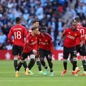 Manchester United players celebrate FA Cup semi-final victory in the penalty shootout over Coventry City. (Photo by Richard Heathcote/Getty Images)