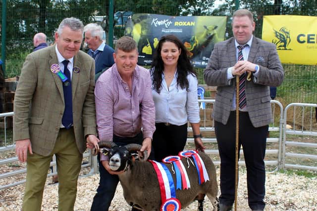 Patrick and Veronica Fullerton with their Sheep Inter-Breed champion at Omagh Show 2023. Adding their congratulations: Tommy Harkin, Tyrone Farming Society (left) and Archie Hamilton (right, who judged the class.