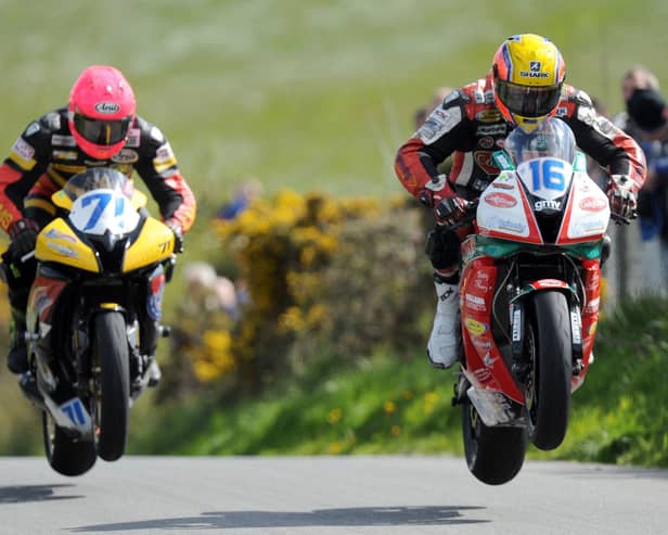 Davy Morgan (Yamaha) and John Burrows (Honda) in the Supersport race at the Cookstown 100 in 2012.
PICTURE BY STEPHEN DAVISON