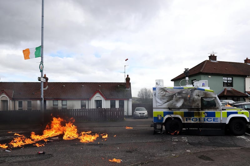 A PSNI vehicle leaves the area after being hit by petrol bombs ahead of a dissident Republican parade in the Creggan area of Londonderry on Easter Monday. Authorities have increased security measures in response to the unnotified parades being held in Derry. Picture date: Monday April 10, 2023.