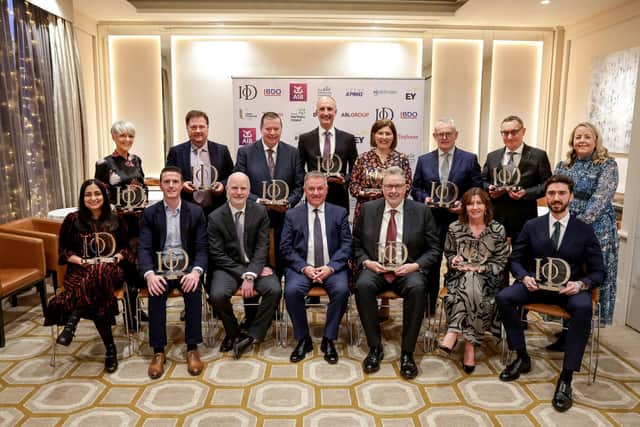 Twelve leading directors from across Northern Ireland have been recognised by the Institute of Directors Northern Ireland at the annual Director of the Year awards. Pictured are the winners alongside Gordan Milligan OBE, chair of the IoD NI, Kirsty McManus, IoD Nations director, Northern Ireland and Brian Gillan, head of retail NI, at title sponsor AIB