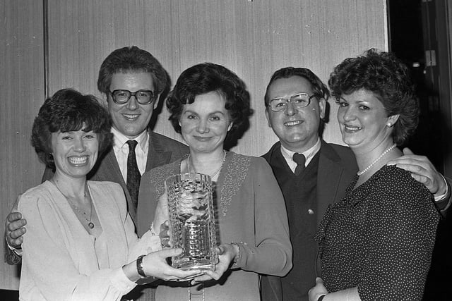 Sue Martin, PRO for Guinness, left, presents the Guinness Dog of the Year trophy to Mrs Mary McGrath from Coalisland, for her dog Coaladine Super at the Northern Ireland Greyhound Owner and Breeders Association dinner dance in January 1983. Included are Mr Peter Meegan, vice chairman, and his wife Terresa and Mr Bobby Carmichael, secretary. Picture: News Letter archives