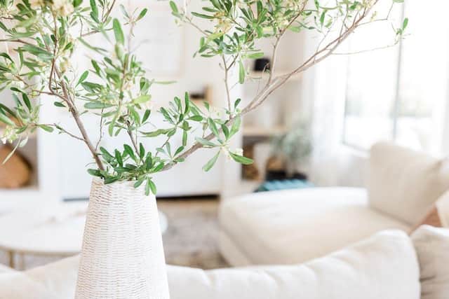 Painting walls and ceilings white, involving plants as much as possible and using mood lighting can all help you make sure your home is a stress-free zone