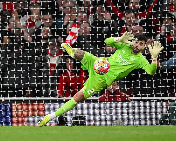 Arsenal's David Raya makes the match-winning save in the Champions League penalty shoot-out win over Porto at Emirates Stadium. (Photo by Shaun Botterill/Getty Images)