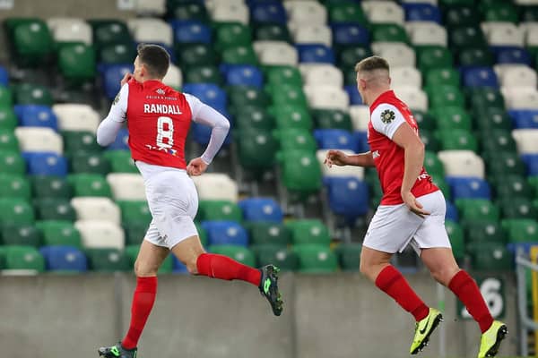 Larne midfielder Mark Randall celebrates his goal against Linfield as the Inver Reds left Windsor Park with a crucial 2-1 victory
