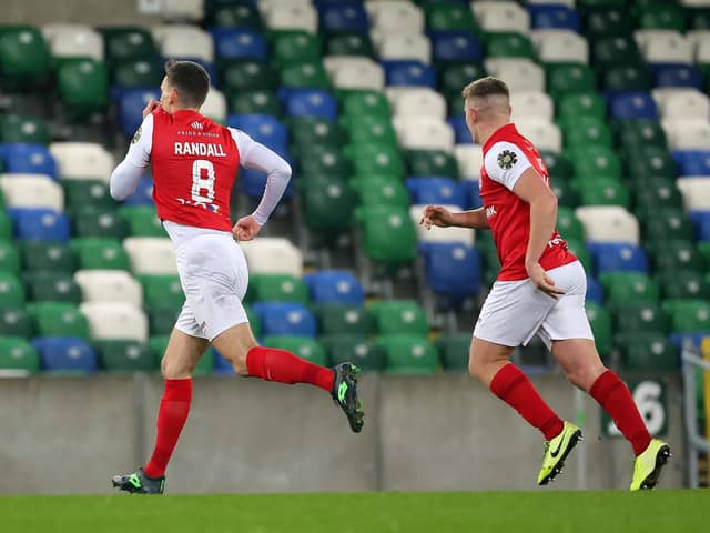 Larne midfielder Mark Randall celebrates his goal against Linfield as the Inver Reds left Windsor Park with a crucial 2-1 victory