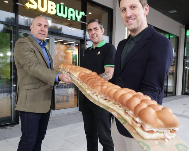 Pictured are Scot Heyes, Adam Heyes and Tristan Scott Heyes, who are the co-franchisees, at the opening of the brand-new Subway store in Rushmere Shopping Centre. Credit PressEye