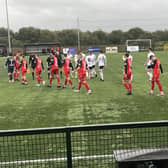 Annagh United and Queen's University players before kick-off in the Boyle Sports Championship clash at Tandragee Road. (Photo by Iconic Media Group)