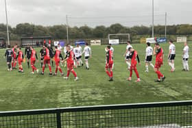 Annagh United and Queen's University players before kick-off in the Boyle Sports Championship clash at Tandragee Road. (Photo by Iconic Media Group)