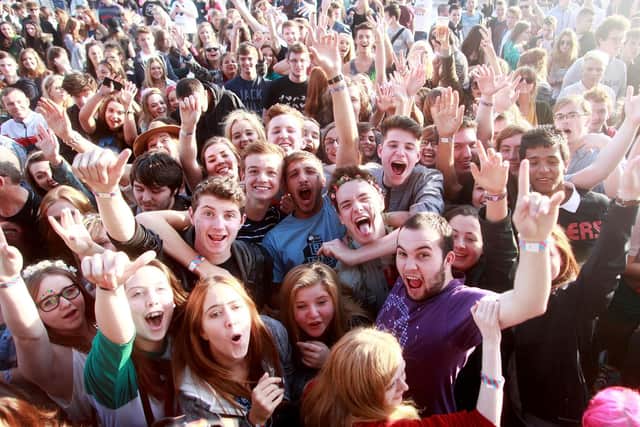 Gig-goers at the Tennants Vital festival in Boucher Road Playing Fields in 2014. Photo: David Fitzgerald