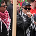 Kneecap's Liam Og O hAnnaidh, speaks to supporters as he leaves Westminster Magistrates' Court, London, where he was charged with a terrorism offence.  The 27-year-old, of Belfast, who performs under the stage name Mo Chara, has been charged with a terrorism offence relating to displaying a flag in support of Hezbollah at a gig at the O2 Forum in Kentish Town, London, on November 21 last year. He faces a month-long wait to find out whether his terrorism charge will be thrown out. Picture: Lucy North/PA Wire