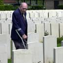 British World War II veteran Bill Hawkins, 83, visits the British Military cemetery of Monte Cassino, Italy, Saturday May 15, 2004. Hawkins is in Italy to participate in the weeklong celebrations scheduled to start Monday May 17,  2004, of the 60th anniversary the Monte Cassino battle, when  Allied forces finally occupied Monte Cassino after a four-month struggle that claimed some 20,000 lives. (AP Photo/ Alessandra Tarantino)