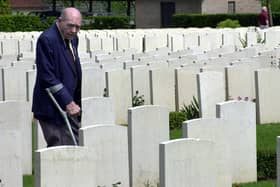 British World War II veteran Bill Hawkins, 83, visits the British Military cemetery of Monte Cassino, Italy, Saturday May 15, 2004. Hawkins is in Italy to participate in the weeklong celebrations scheduled to start Monday May 17,  2004, of the 60th anniversary the Monte Cassino battle, when  Allied forces finally occupied Monte Cassino after a four-month struggle that claimed some 20,000 lives. (AP Photo/ Alessandra Tarantino)