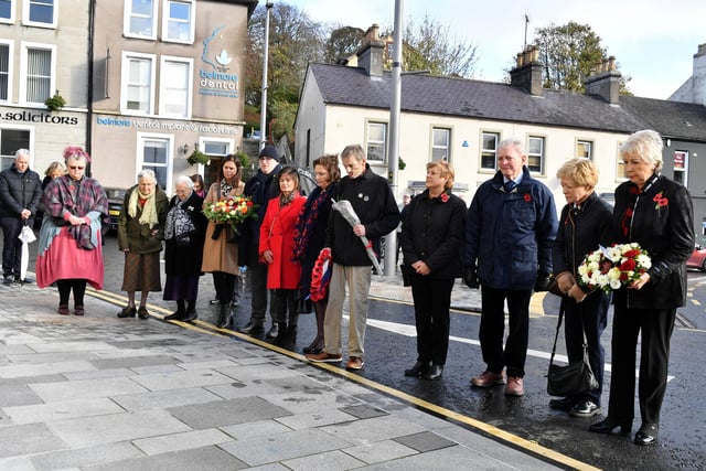 Family members pictured during a wreath-laying ceremony  this morning to mark the 35th anniversary of the Remembrance Sunday bombing.