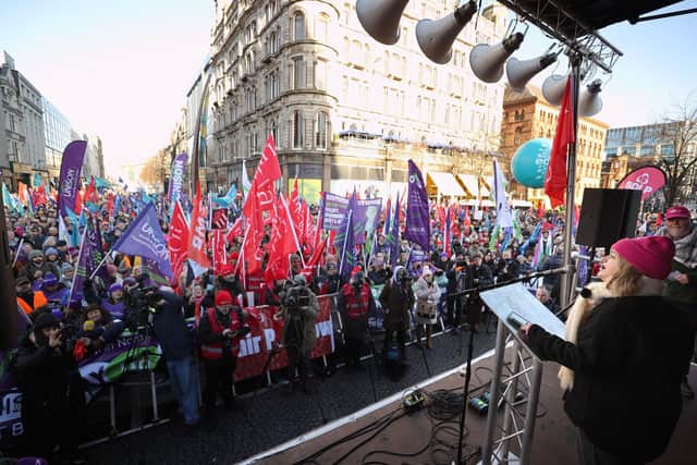 Jo Grady, General Secretary UCU, addresses union members outside Belfast City Hall, Belfast, as an estimated 150,000 workers take part in walkouts over pay across Northern Ireland