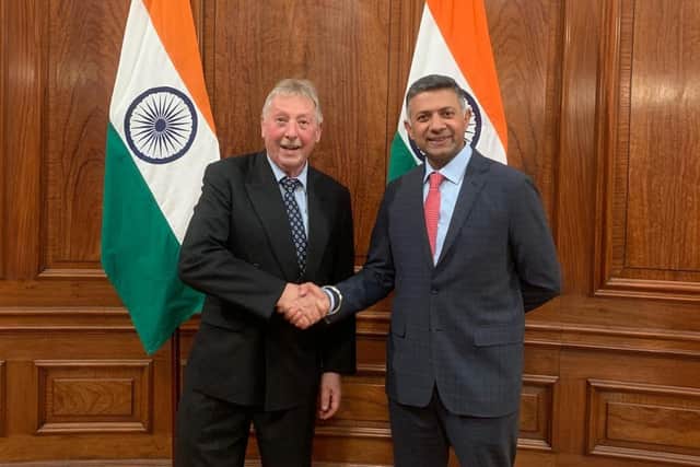 Sammy Wilson pictured with the Indian trade envoy, taken from a tweet Mr Wilson posted