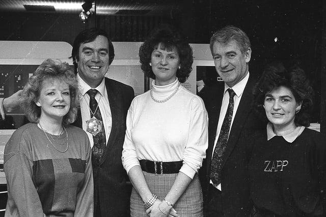 Hannah Stewart, June Nellins and Marie Graham, who were studying for their business and finance diplomas at the Belfast Institute of Further and Higher Educations, pictured at the end of February 1992 at an Institute of Personnel Management meeting sponsored by British Telecom, with institute branch chairman Andrew Dougal and George McGrath, BT deputy chief executive. Picture: News Letter archives
