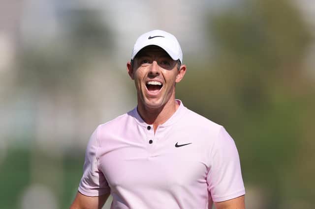 Northern Ireland's Rory McIlroy celebrates after an eagle putt on the 18th green during round three of the Hero Dubai Desert Classic at Emirates Golf Club. (Photo by Richard Heathcote/Getty Images)