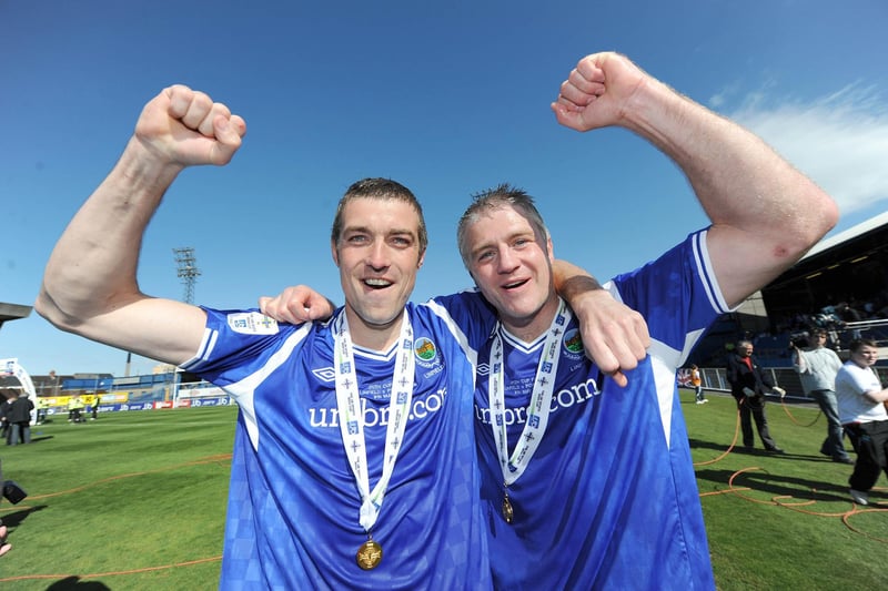 Linfield's Stephen Douglas and William Murphy celebrate beating Portadown