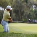 Northern Ireland's Rory McIlroy plays a shot on the ninth hole during the third round of The Players Championship at TPC Sawgrass in Florida on Saturday