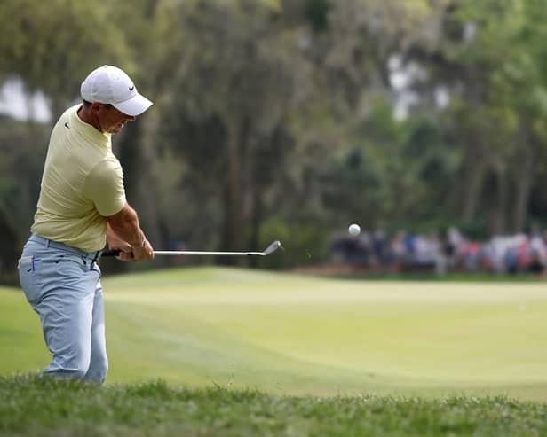 Northern Ireland's Rory McIlroy plays a shot on the ninth hole during the third round of The Players Championship at TPC Sawgrass in Florida on Saturday