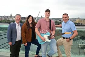 Masters student Daniel Coulter and his Belfast-based band, 4amclub, will open the show at Ebrington Square on Saturday, August 29, after emerging victorious in a competition open to Ulster University student musicians. Pictured is Daniel with Live @ the Square festival promoter Karl Diamond and UU reps