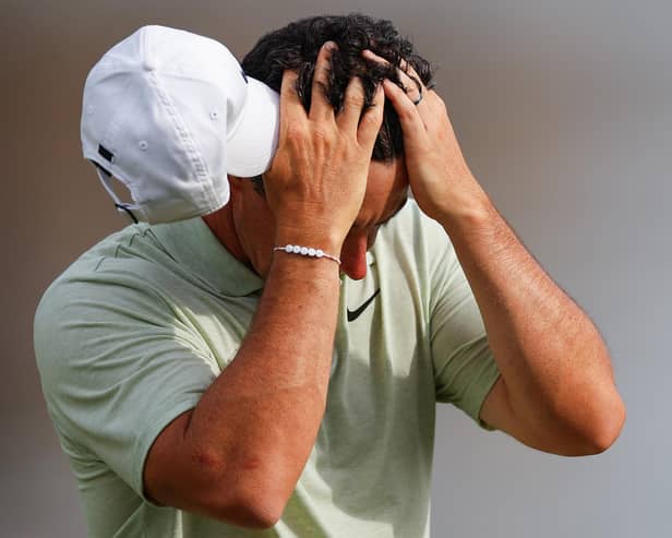 Northern Ireland's Rory McIlroy reacts as he walks off the 18th hole after finishing the final round of the Arnold Palmer Invitational in Orlando, Florida. (Photo by Mike Ehrmann/Getty Images)