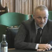 Jamie Bryson at the Northern Ireland Affairs Committee at the House of Commons, which is investigating paramilitary activity, on Tuesday. He says: 'There is a difference between something being legal (ie, Parliament may do it) and something being constitutional' Photo: House of Commons/UK Parliament/PA Wire