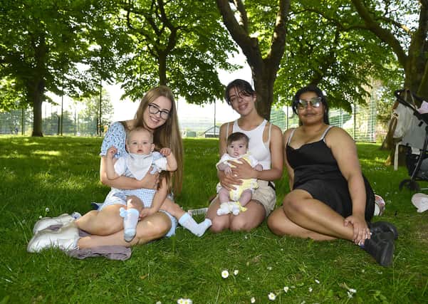 Bonnie and Kareem 11 months old, Amy-Leigh and Jada-Rose 4 months old and 
Ayah Salem pictured enjoying the weather at Waterworks on the Antrim road in Belfast