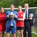 Pictured with the Mayor of Antrim and Newtownabbey, Councillor Mark Cooper at the SuperCupNI 2024 Girls’ draw is Victor Leonard, Chairperson of the SuperCupNI and young footballers Layla Sands, Crusaders; Morgan Gibson, Linfield; and Ella Kitson, Larne