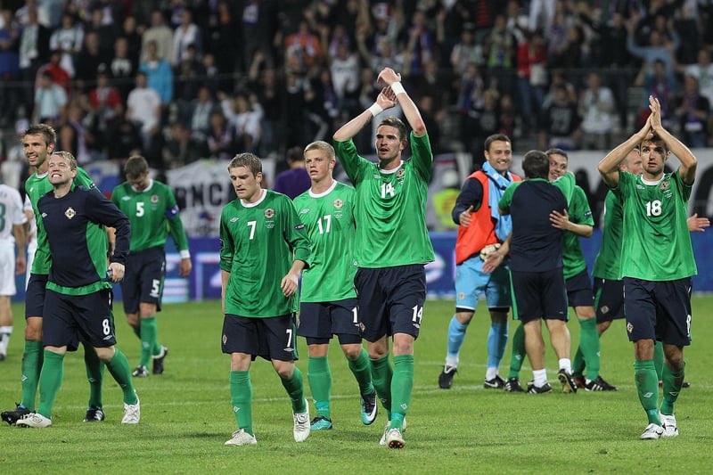 Northern Ireland players thank the fans for their support in Slovenia