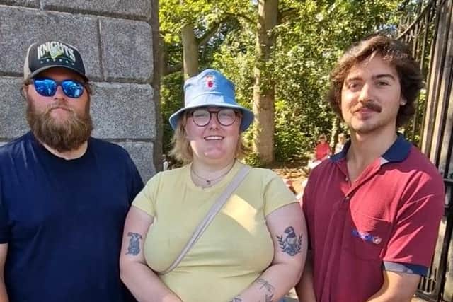 From left: Noel and Paige Kelly and Benjamin Maharaj from Ontario enjoyed their third visit to the parade.