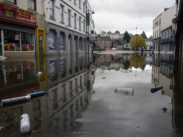 A view of debris and flood water in Sugar Island as the clear up begins in Newry Town, Co Down, which has been swamped by floodwater as the city's canal burst its banks amid heavy rainfall.