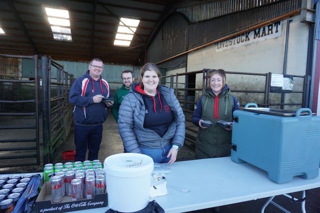 Simon Agnew, Colin McMinn, Rebecca Cromie and Roberta Simmons serving up the stew to warm everyone up at the tractor run at the tractor and truck run. Picture: Rathfriland YFC