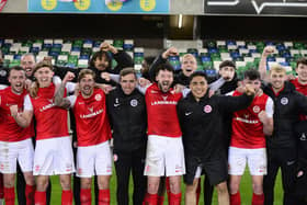 Larne players line up in front of the fans after a 1-1 draw with Linfield at Windsor Park left the club set for a second successive Irish League title party. (Photo by Arthur Allison/Pacemaker Press)