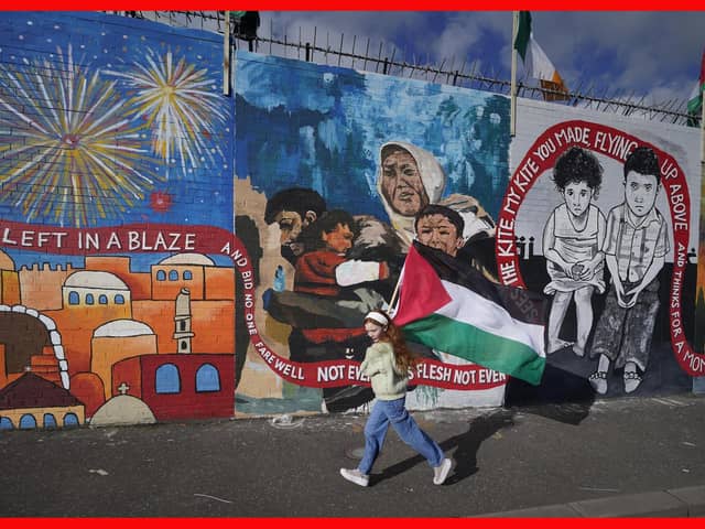 10-year-old Erin Corscadden at the unveiling of the International Wall in Belfast after it was transformed into a Gaza mural